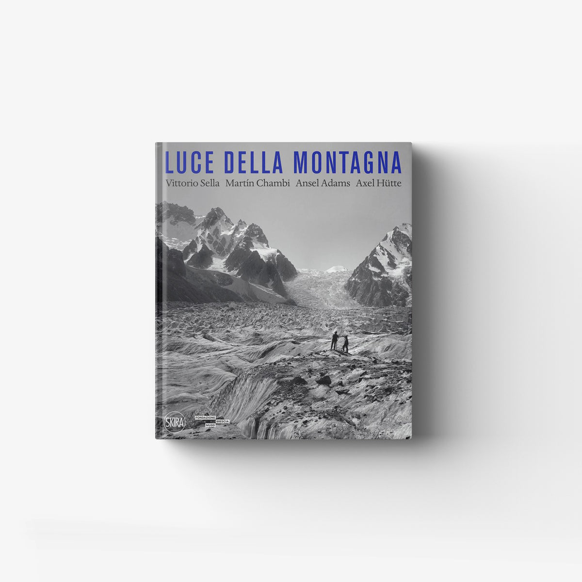 Mountain photography book in black and white and colour by Skira Arte, with Alpine landscape cover